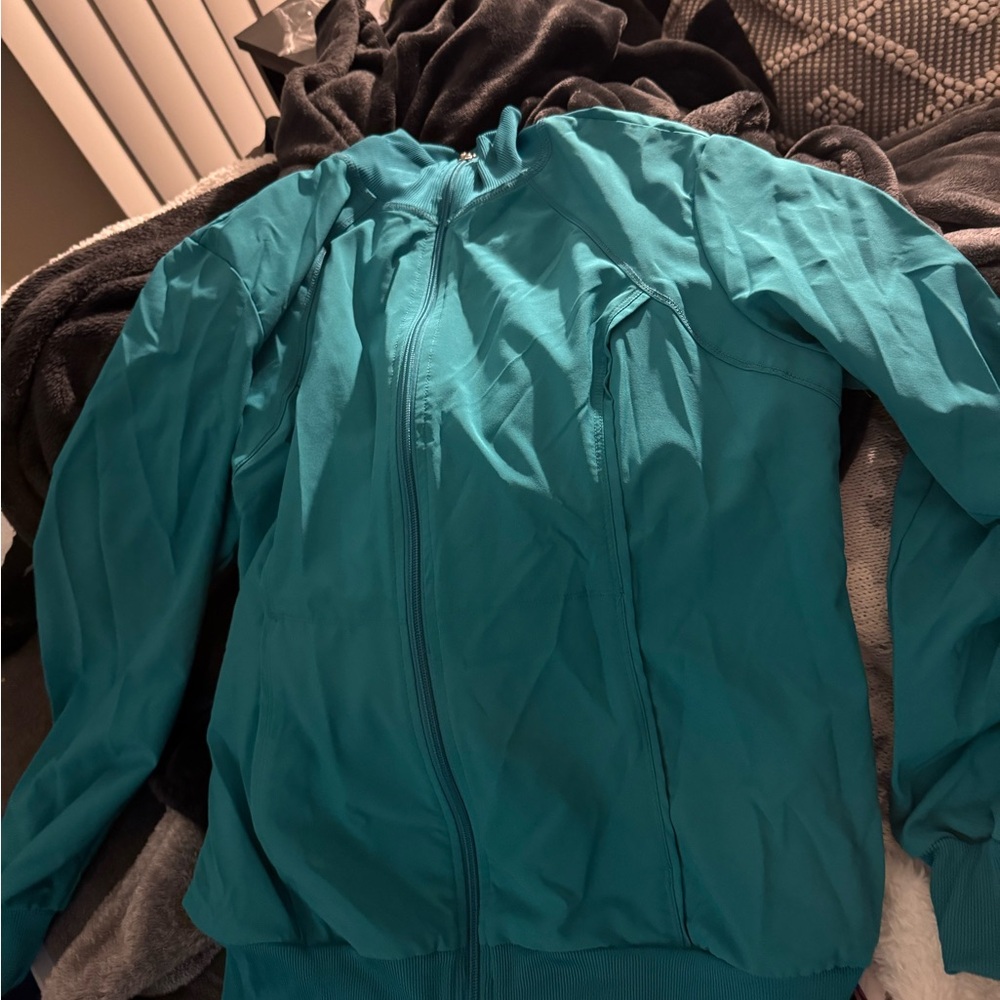 Infinity
Women's Zip Front Warm-Up Solid Scrub Jacket